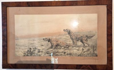 tableau représentant un chien et un chat, encadré dans un cadre en bois et accroché au mur