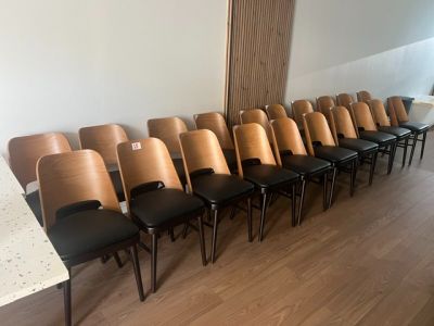 a lot of chairs that are lined up in a row