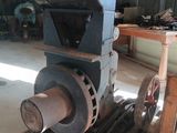 a machine that is sitting on a table in a warehouse