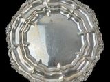 an image of a silver plate on a black background