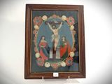 a painting of jesus on the cross in a wooden frame