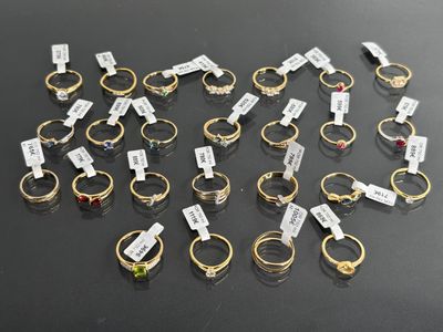 a lot of rings that are sitting on a table
