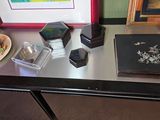 a picture of a table with a book and a plate of food on it