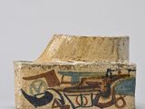 an image of a piece of pottery with a painting on it