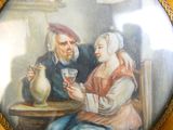 a painting of a man and woman sitting at a table