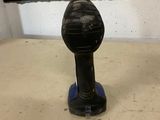 a black object on the floor in a room