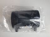 a small black object in a plastic bag on a table
