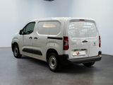 a white van that is parked in a room
