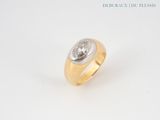 an image of a gold and silver ring with a diamond