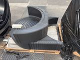 a pile of tires sitting on top of a pallet