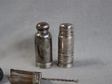two salt and pepper shakers on the table