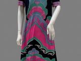 an image of a mannequin wearing a colorful dress with waves on it