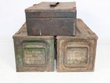 two old metal boxes stacked on top of each other