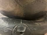 a close up of a soccer ball on top of a ball stand