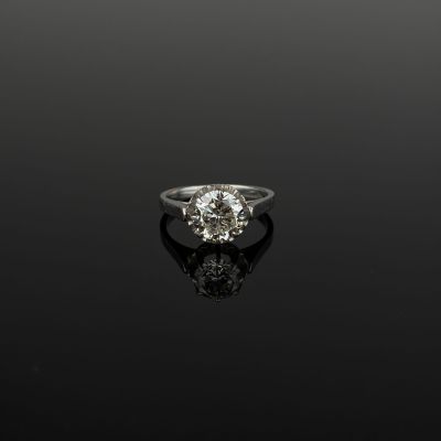 a diamond single - stone ring,