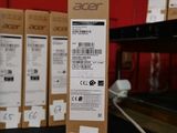 a box with a price tag on it sitting in front of a bunch of packages