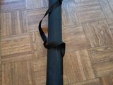 a black yoga mat laying on the floor in a room