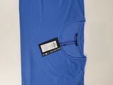 a pair of blue pants with a tag on them