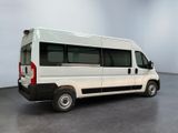 a white van that is parked in a room