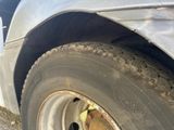 a close up of a tire on a car