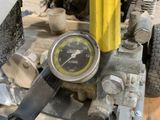 a close up of a tire with a gauge