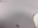 a small cup that is sitting on top of a table