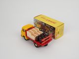 a toy truck with a box of chocolates on the back of it