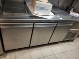 a box sitting on top of a stainless steel counter