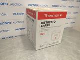 une boîte de produits « Thermo Ristretto Care » posée sur une table