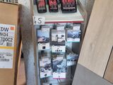 a display of cell phones in a store next to a cardboard box