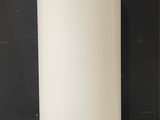 l'image d'un réfrigérateur blanc dans une pièce