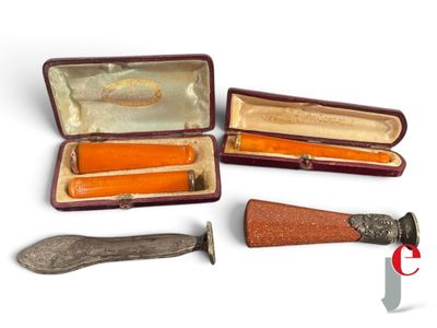 three different types of knives in a case on a white surface
