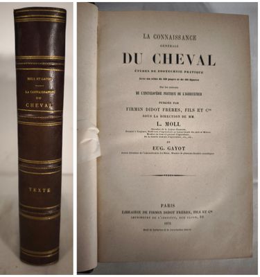 an old book with a brown cover sitting on top of a table