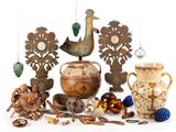 many different types of vases and ornaments on the table