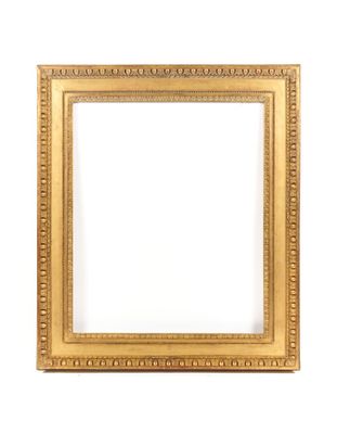 un cadre doré orné d'un motif décoratif sur fond blanc