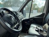a view of the inside of a vehicle from the driver ' s seat