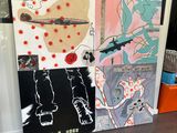 trois réfrigérateurs peints avec des motifs différents
