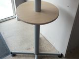 a table that has two small tables on top of it