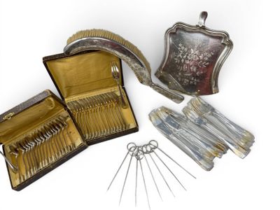 a silver case with a set of needles in it