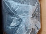 a box that has a plastic bag inside of it