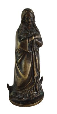 an image of a statue of a woman holding a cat