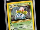 a close up of a pokemon card in a plastic holder