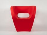an image of a red chair with a hole in the middle