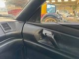 a view of a car ' s dashboard from inside the car