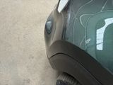 a car that has a sticker on the hood of it