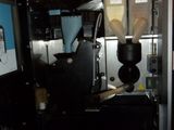 an image of a coffee machine in a dark room