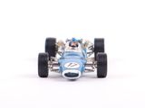 a toy car that is sitting on a white surface
