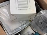 a cardboard box with a bunch of items inside of it