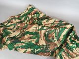 an image of a close up of a green and brown camouflage jacket