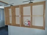 a shelf that has a bag on top of it